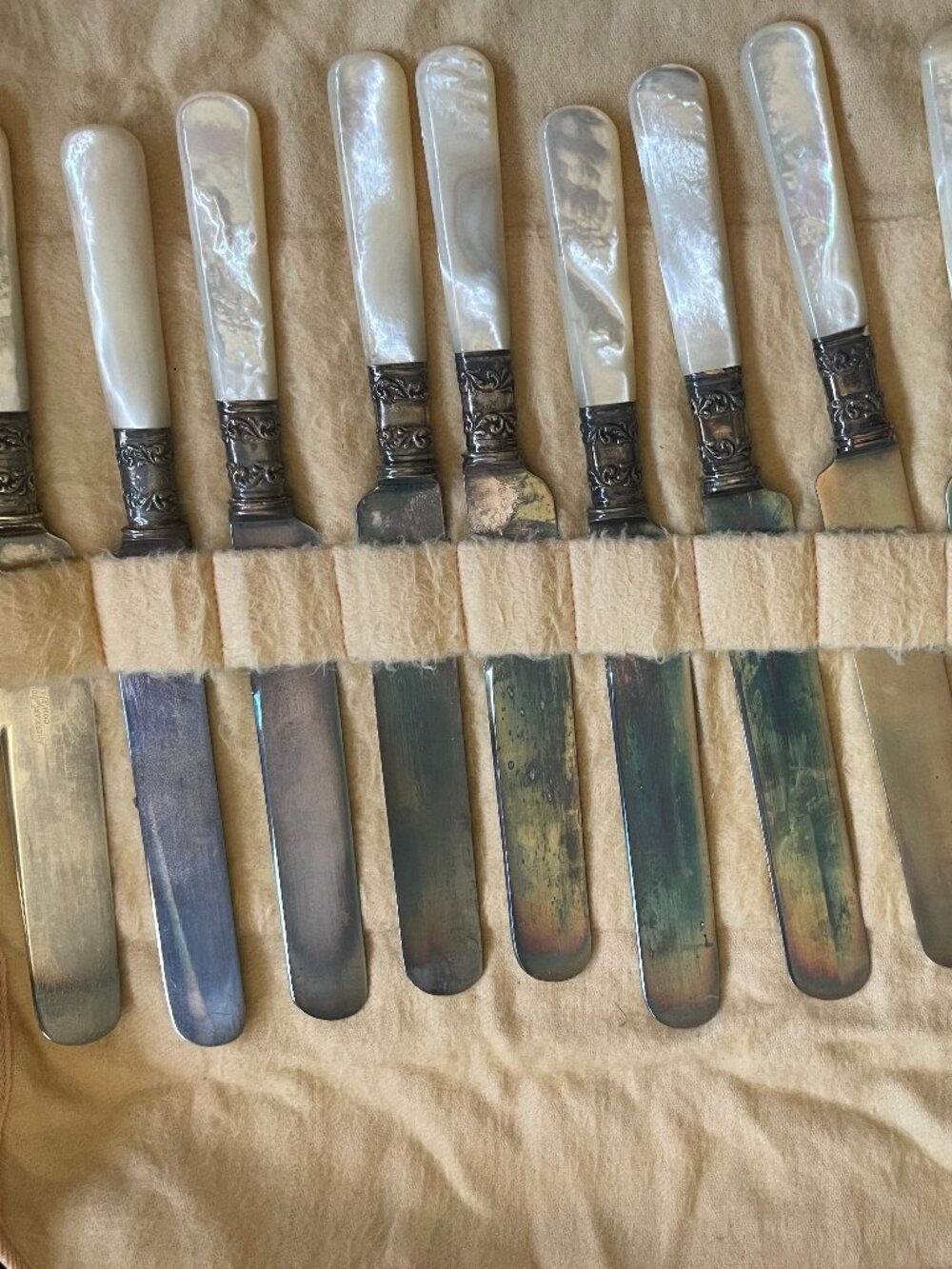Set of 12 Vintage Mother‑of‑Pearl Dessert Knives with Ornate Silver‑Tone Collars